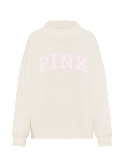 Oversized Mock-Neck Sweatshirt styled for an off-duty look.