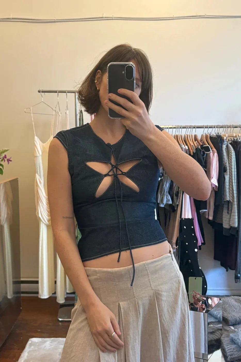 Back view of the Denim Star Top showing the full lace-up detail.