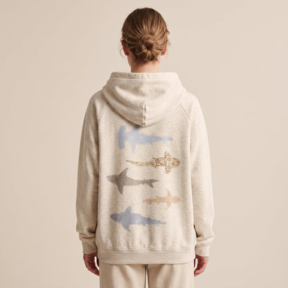 Shark pod print across the back of the Shark Bay Hoodie.
