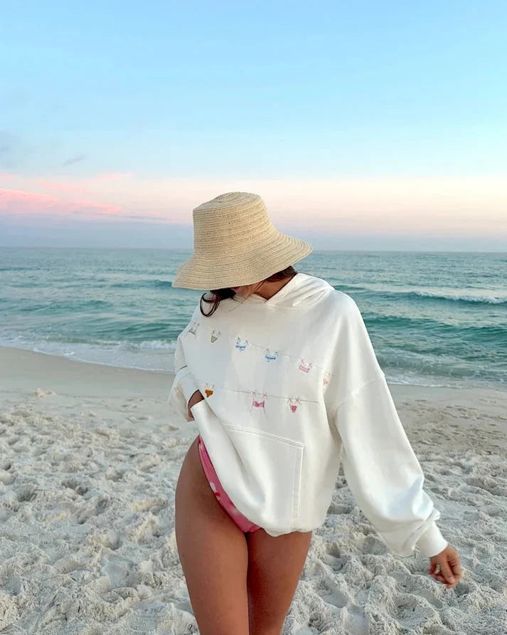 Drawstring hood and ribbed cuffs on the Surf Shack Hoodie.