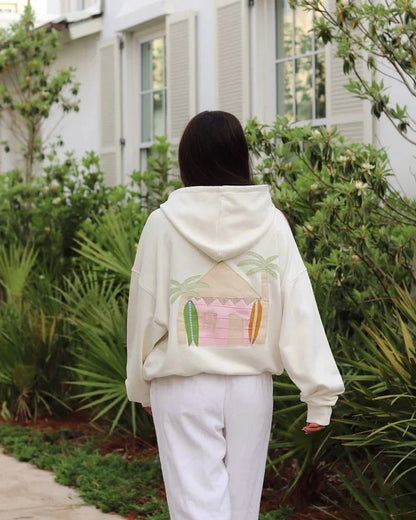 Surf Shack Hoodie with a hand-stitched applique of palm trees.